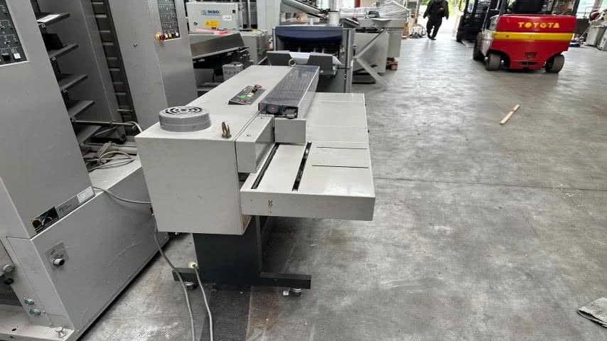 Horizon, GM 5 Spine taping machine